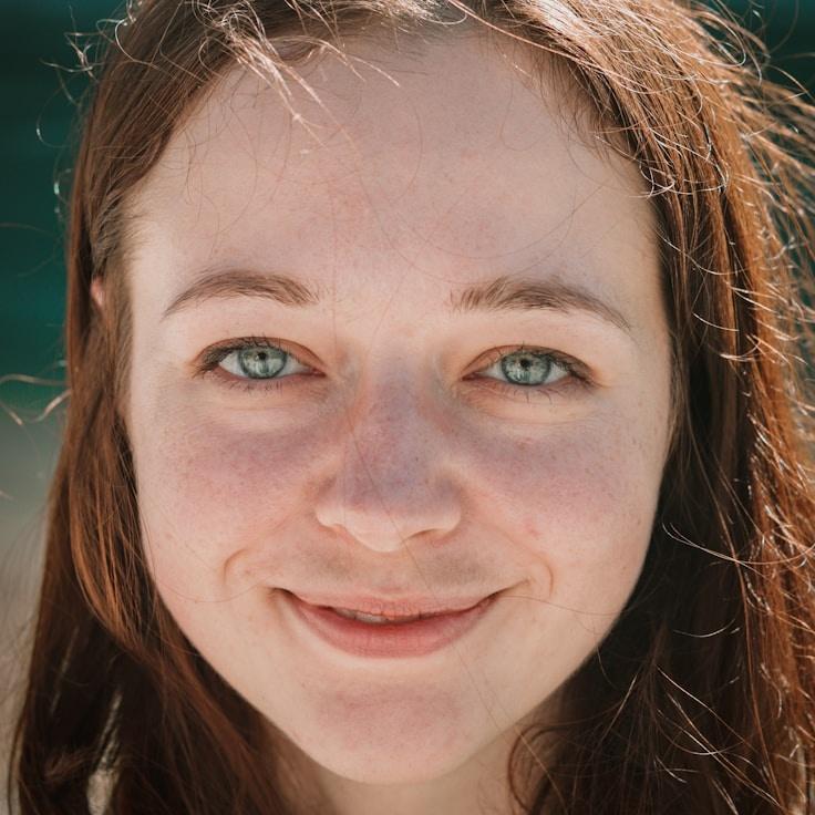 Kaveri Mehta, Lead Design Curator at VertexStoneAtlas, reviewing corporate floral arrangements